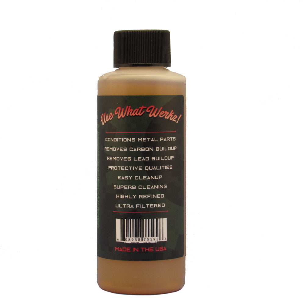Back side of label of 4 ounce bottle of Gun Werkz cleaner on a white background