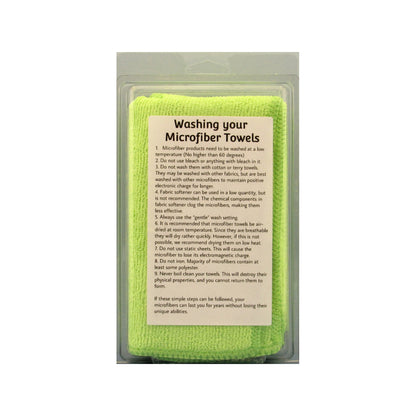 Backside of package of green Gun Werkz microfiber towels with washing instructions on a white background
