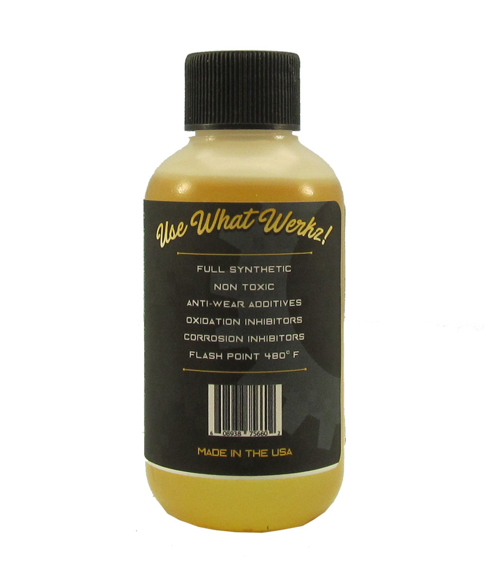 Backside of Gun Werkz Ultra Gun Oil with the words "Full Synthetic, Non Toxic, Anti-Wear Additives, Oxidation Inhibitors, Flash Point 480 degrees" on a white background.