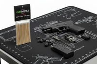 picture of Gun Werkz low lint cotton swabs on a stainless steel table with a disassembled Glock 19 on a black cleaning mat on the table