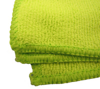 Close up view of green Gun Werkz professional quality micro fiber towels on a white background